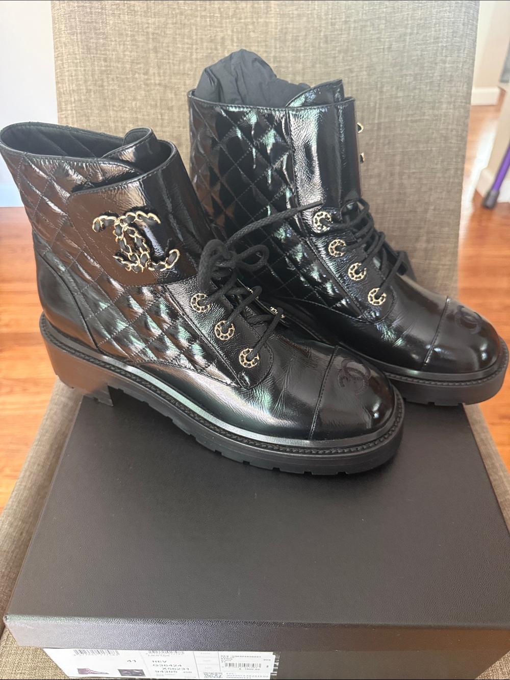 CHANEL Black Quilted Patent Leather Combat Boots with Gold CC Chain
